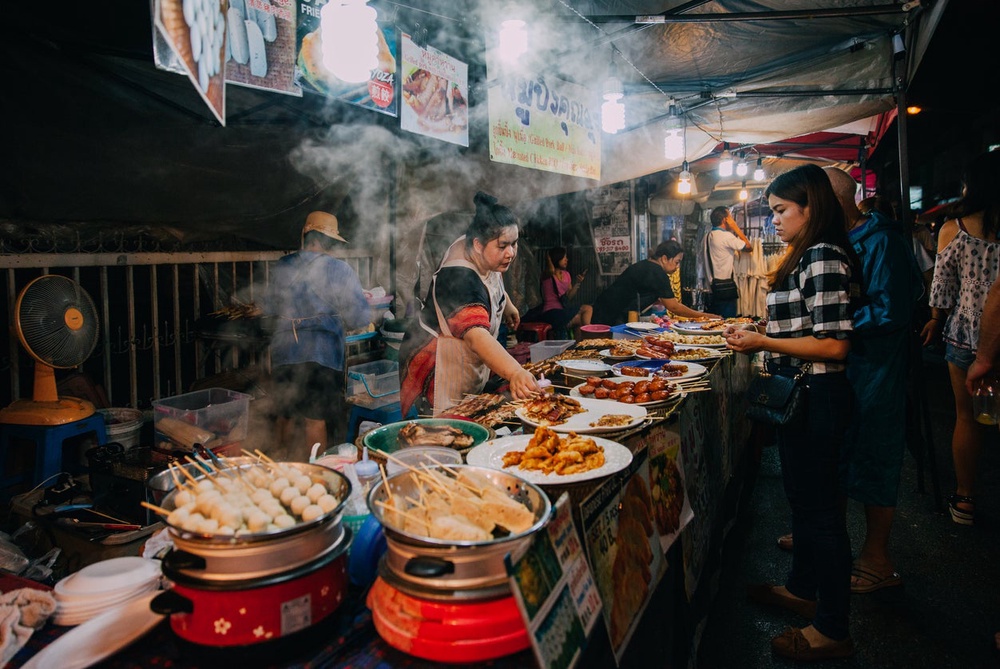 Indulge in delicious street food including pad Thai and moo ping (Getty Images)