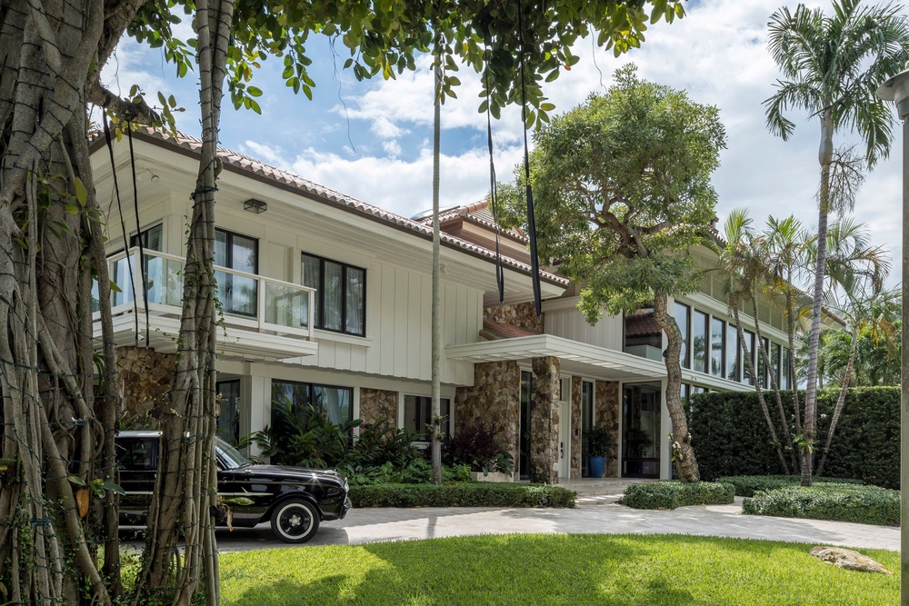 Sales of luxury real estate, like this Miami home owned by musician Joe Jonas and actress Sophie Turner, are charging ahead, rising 6.2 percent in May (Jam Press/Michael Stavaridis & A)