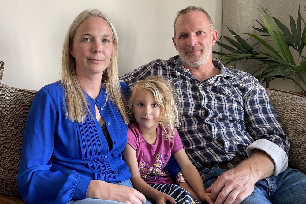 Jack and Sarah Hawkins and their daughter Lottie at home in Nottingham (PA)