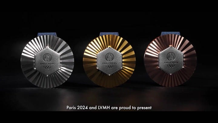 First look at Paris 2024 Olympic medals embedded with pieces of Eiffel ...