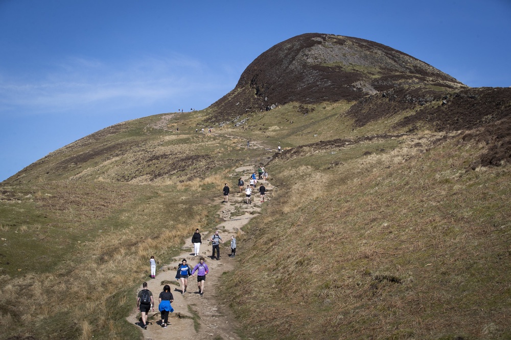 Increasing the intensity of your walk by upping the pace or tackling a hill can deliver greater health benefits (PA)