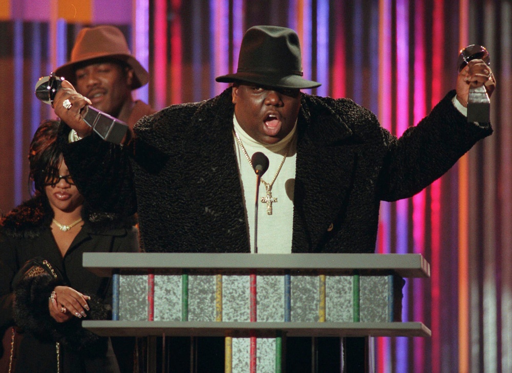 Before Shakur was shot in 1994, he and Wallace were friends and performed on stage together (AP)