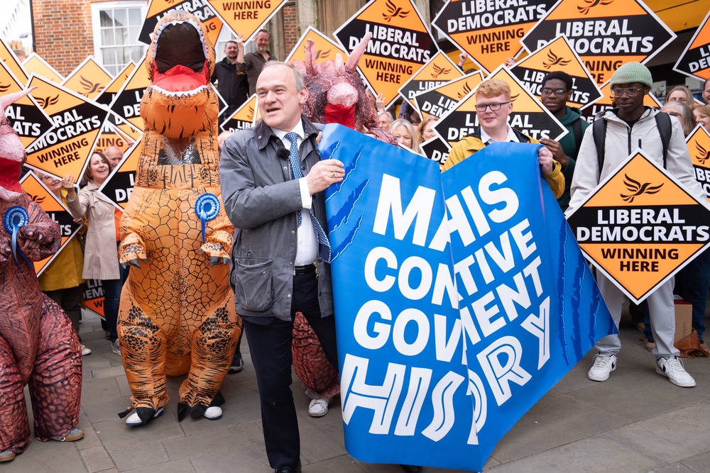 Sir Ed Davey poses with ‘Tory dinosaurs’ in latest election campaign stunt