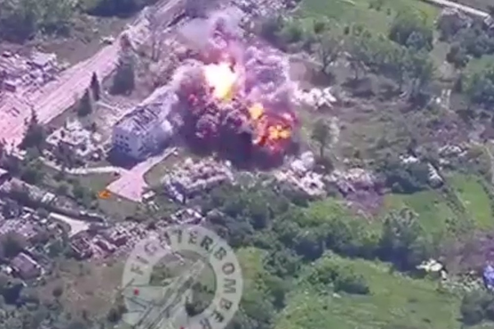 A screenshot from a video posted by Russian military blogger Fighter Bomber allegedly shows the moment a 3000kg glide bomb explodes in Kharkiv Oblast (Telegram)