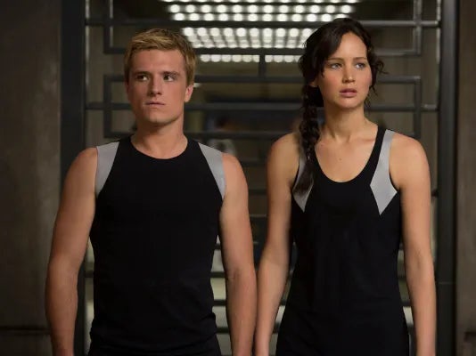 Josh Hutcherson as Peeta Mellark and Jennifer Lawrence as Katniss Everdeen in ‘The Hunger Games: Catching Fire’ (Lionsgate)