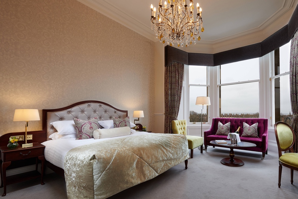 Fall asleep in a delightfully chintzy medley of velvet and tufted leather (The Bonham)