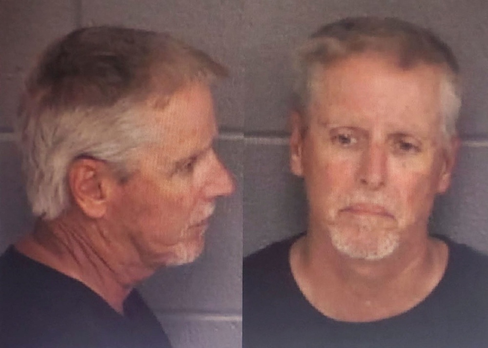 Colin Gray, 54, father of 14-year-old suspected Apalachee High School shooter Colt Gray, poses for police booking photos released September 5 (Barrow County Sheriff’s Office)