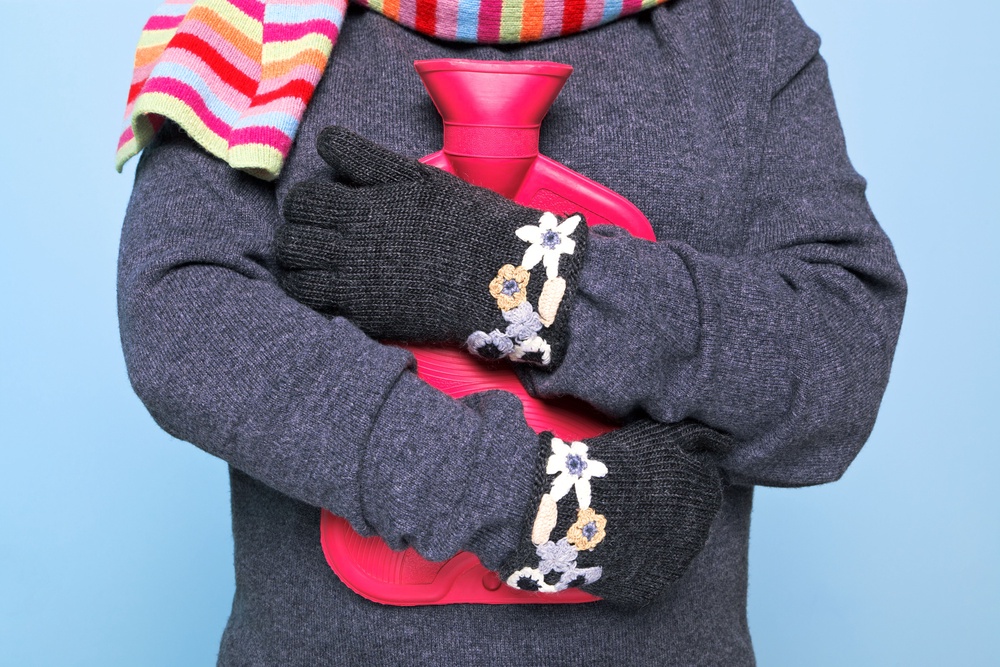 A hot water bottle is an affordable and effective way to provide targeted warmth (Alamy/PA)