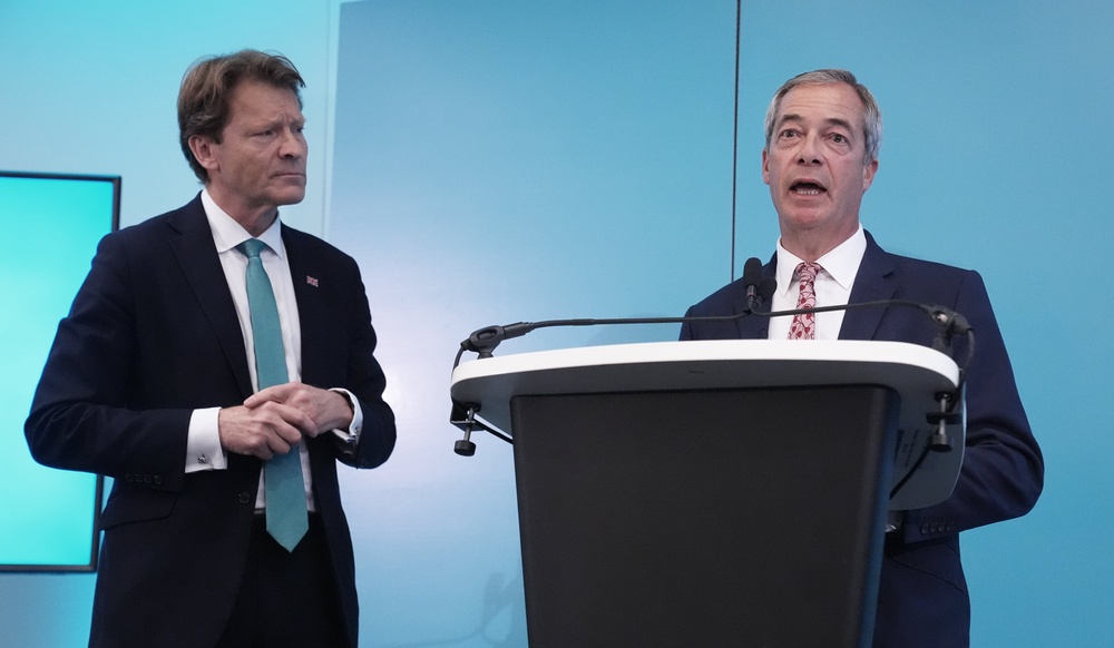 Leader Nigel Farage (right) and Deputy leader Richard Tice, speaking during a Reform UK press conference on law and order in Westminster (Lucy North/PA Wire)