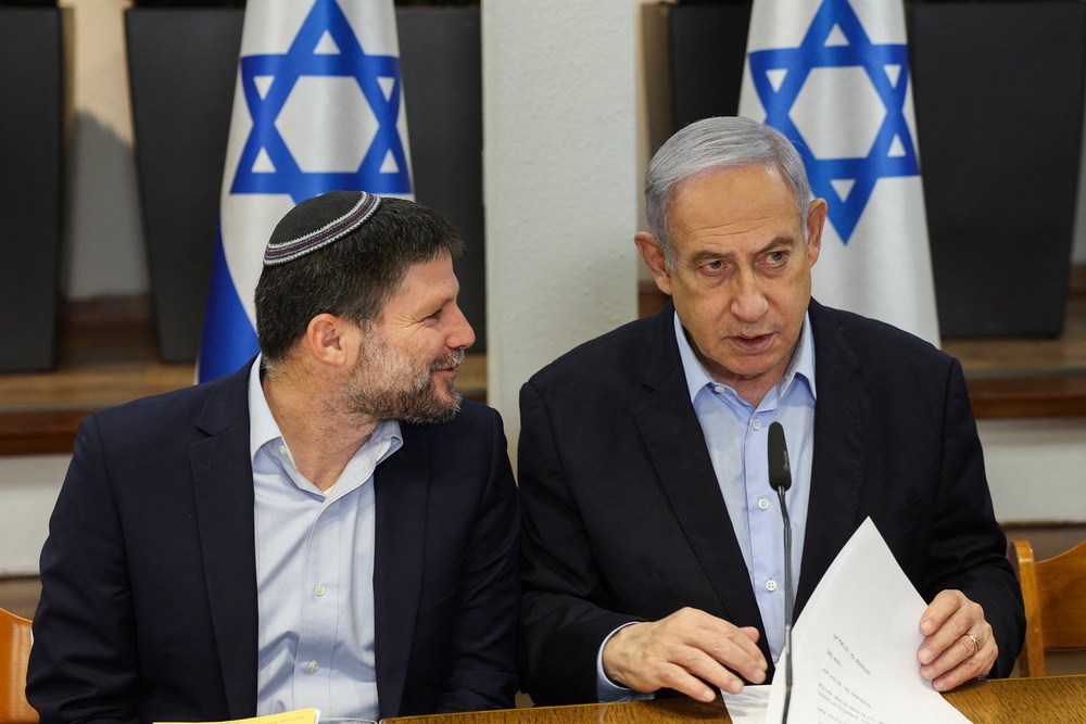 Netanyahu’s minister of finance Bezalel Smotrich, left, may be targeted by Lord Cameron’s sanctions (AFP/Getty)