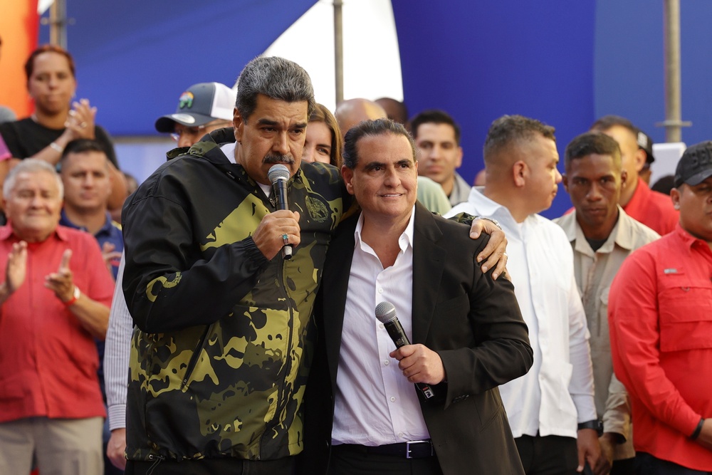 Saab pictured with Venezuela’s former president Maduro in 2024 (AP)