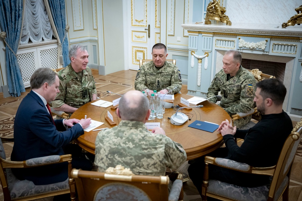 Handout photograph taken on November 21, 2024 shows Ukrainian President Volodymyr Zelensky (R), Commander-in-Chief of the Armed Forces of Ukraine Oleksandr Syrsky (2nd, R) during their meeting with the Chief of the Defence Staff of the United Kingdom Admiral Tony Radakin (top L) in Kyiv (UKRAINIAN PRESIDENTIAL PRESS SER)
