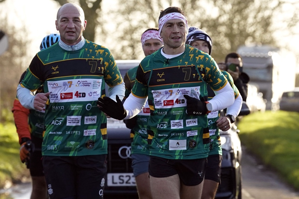 Kevin Sinfield’s (right) final charity event for MND will take in all 12 English Super League grounds (PA)