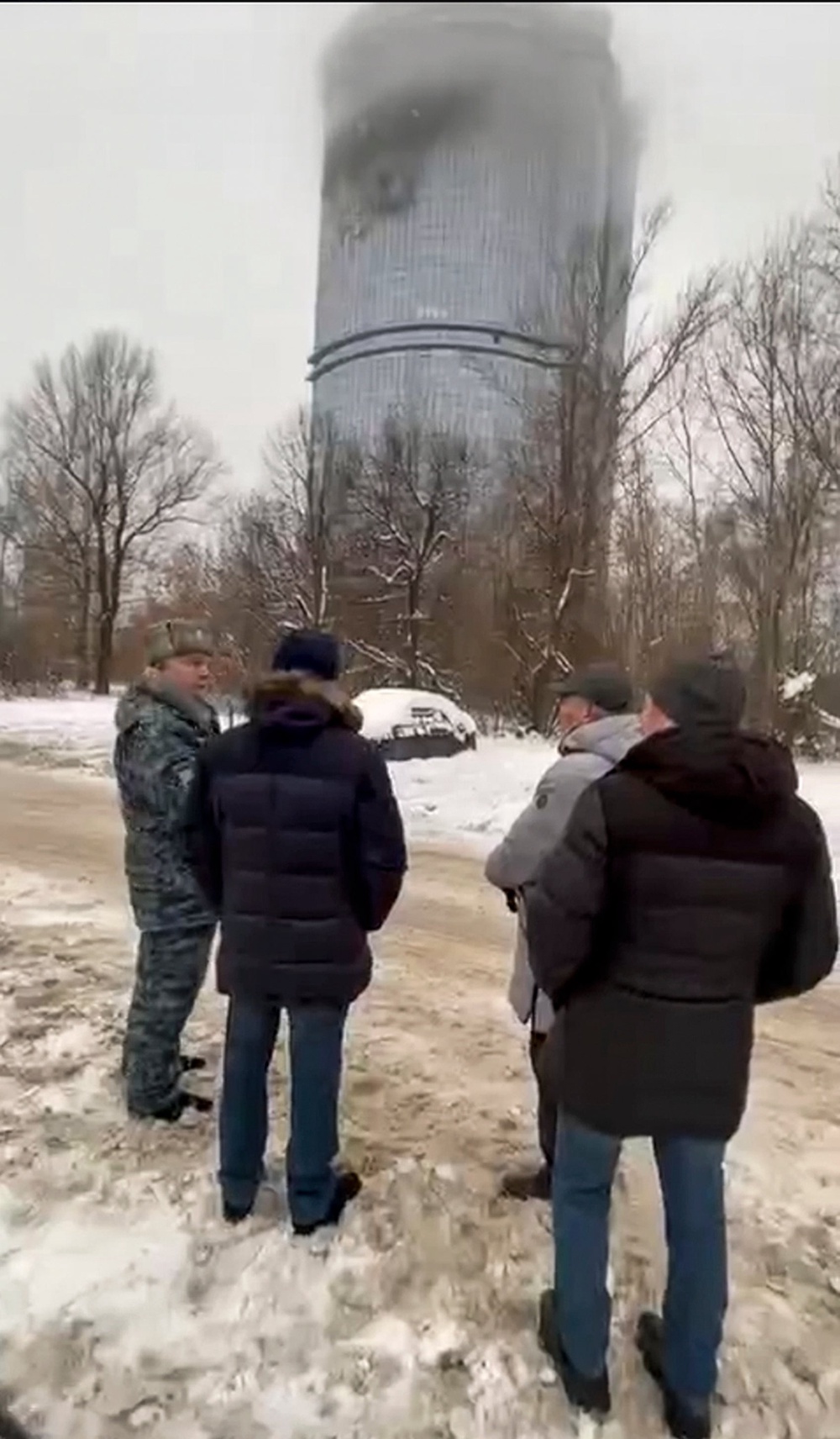 Local officials look at a damage site at the residential complex in Kazan, Russia, following Ukrainian drone attacks (Official Telegram channel of the Kazan City Hall)