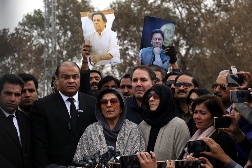 Aleema Khan, centre, sister of Imran Khan, speaks to the media in Rawalpindi (EPA)