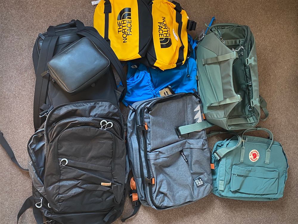 A selection of the tried and tested travel backpacks (Tamara Hinson/The Independent)