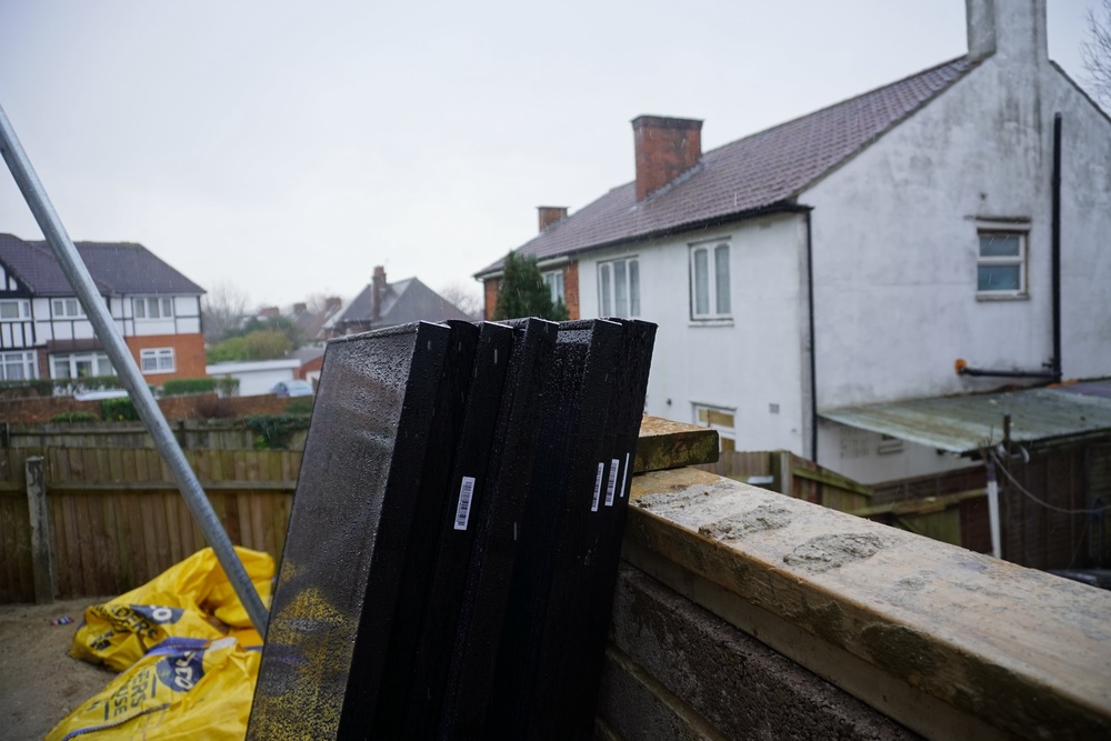 A stack of solar panels ready to be fitted to a house in Watford (Howard Mustoe/The Independent)