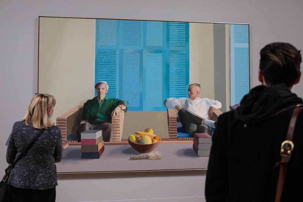 Visitors view ‘Christopher Isherwood and Don Bachardy’ (1968) by David Hockney (Getty)