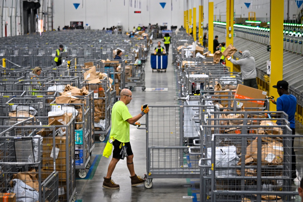 Amazon employees work to fulfill same-day orders during Cyber Monday in November 2025 (Getty Images)