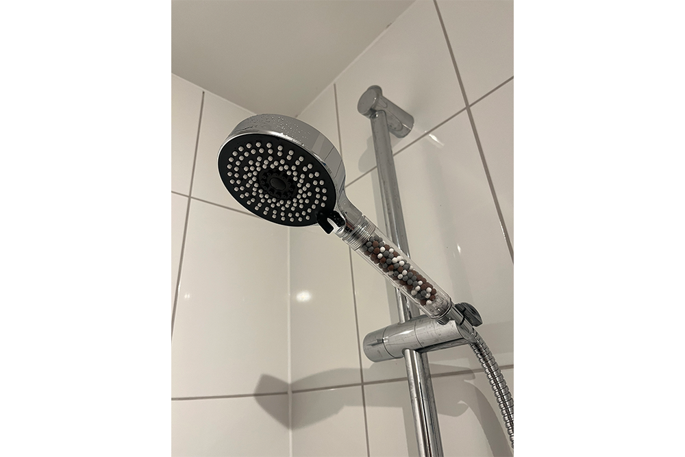 Image from: Best shower filters to protect hair from hard water, tested by a beauty editor