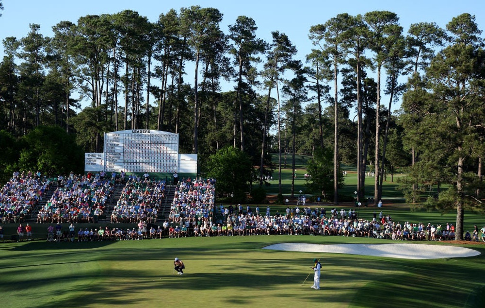 Scottie Scheffler putts out on the 15th green at Augusta National (Getty Images)