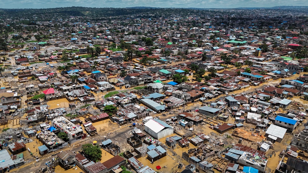 An aerial photo of floods that hit Kinshasa in April 2025. Climate-driven shocks such as this impact food security by disrupting supply systems and limiting people’s ability to earn an income (AFP/Getty)