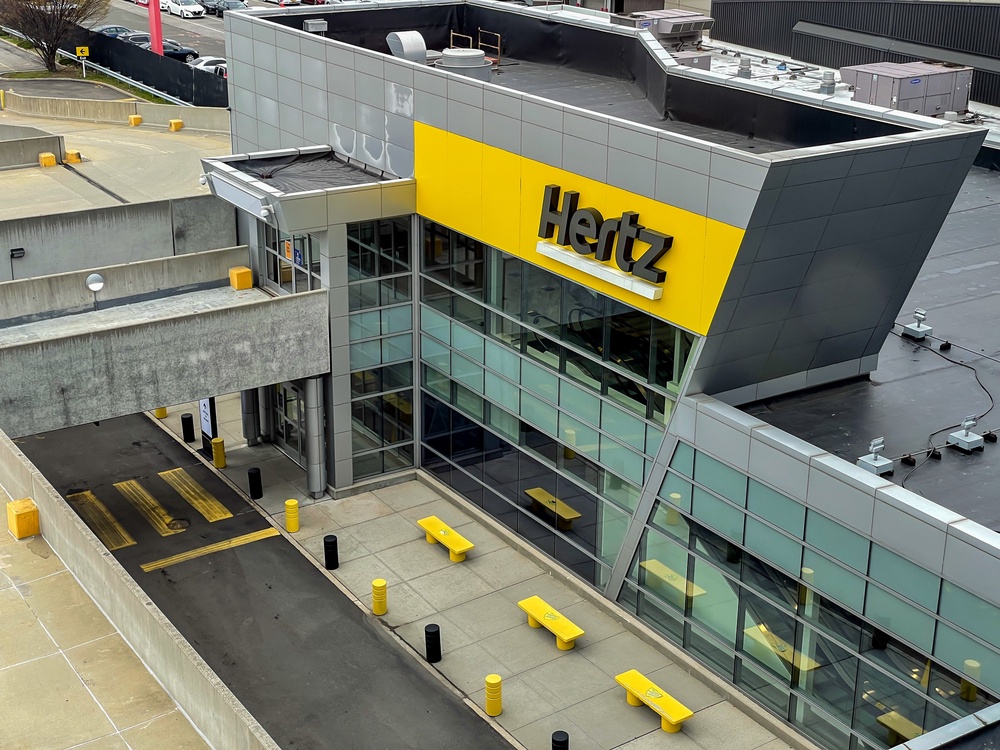 Hertz said the fee could be found by clicking on a link for qualifications and requirements (Getty)