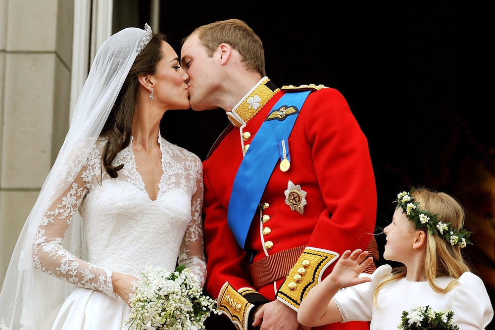 Prince William and his wife Kate Middleton on the balcony of Buckingham Palace, London, following their wedding at Westminster Abbey in 2011 (John Stillwell/PA Wire)