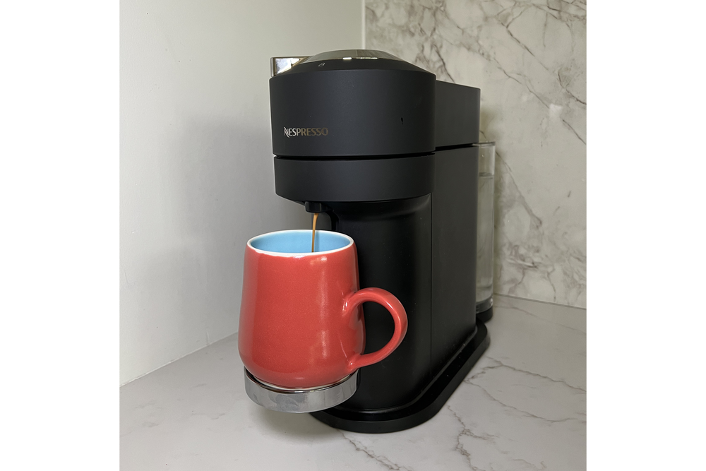 The vertuo next can brew espresso and full-size coffee with the push of a button (Brigitt Earley/The Independent)