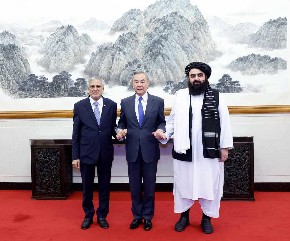 Chinese foreign minister Wang Yi with Pakistani counterpart Ishaq Dar and Taliban’s foreign affairs minister Amir Khan Muttaqi (X/ SpoxCHN_LinJian)