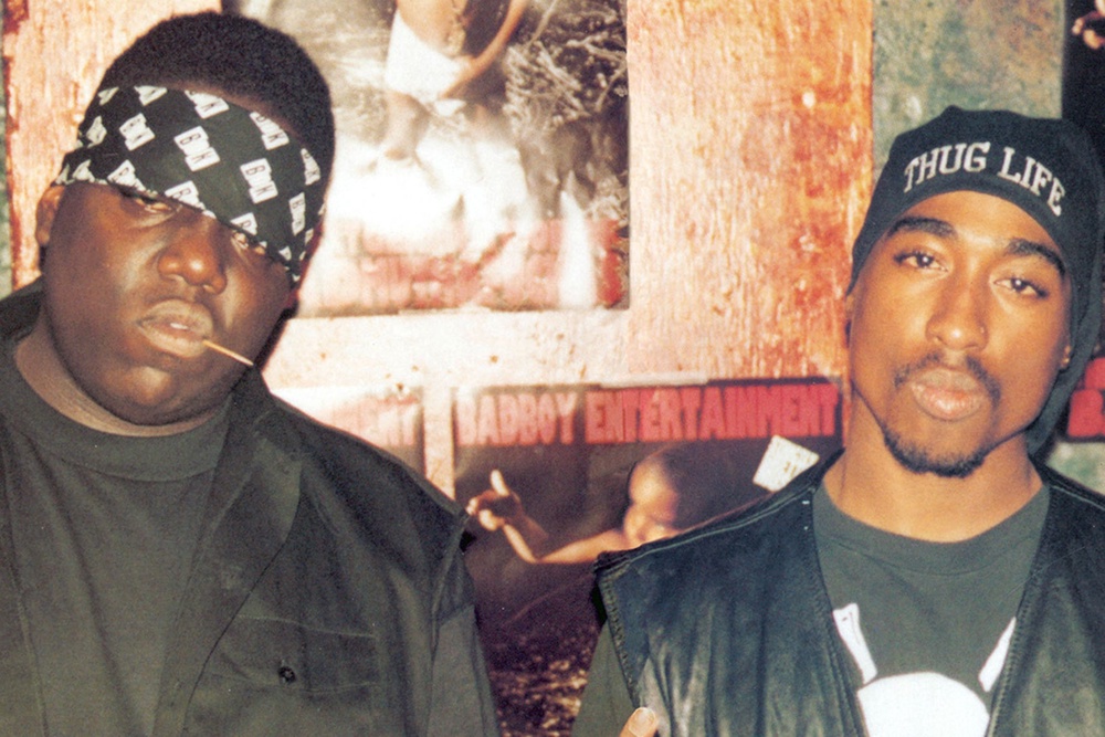 At the time of his death, Shakur was involved in a beef with Brooklyn-based Biggie Smalls, the pair are shown together prior to their falling out (Kobal/Shutterstock)