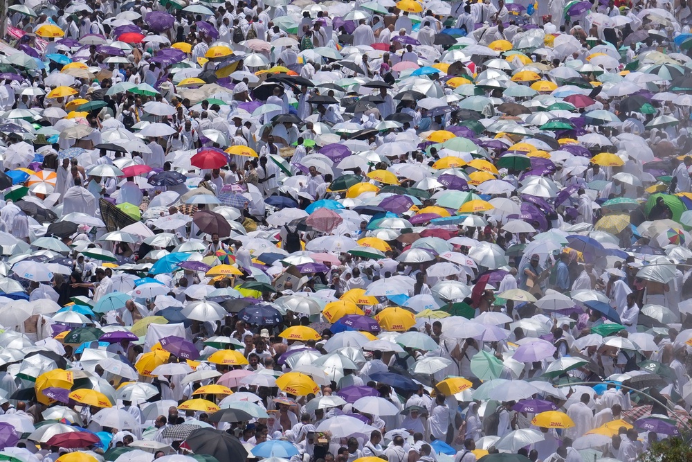 Muslim pilgrims use umbrellas to shield themselves from the sun as they gather outside Nimrah Mosque to offer the noon prayers in Arafat, on the second day of the annual hajj pilgrimage, near the holy city of Mecca, Saudi Arabia, Saturday, June 15, 2024. (AP Photo/Rafiq Maqbool, File) (Copyright 2024 The Associated Press. All rights reserved)