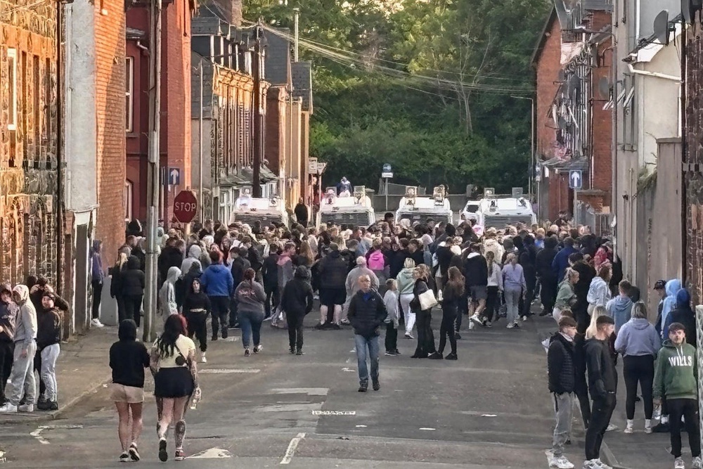Riot police use water cannon after missiles thrown at officers during ...