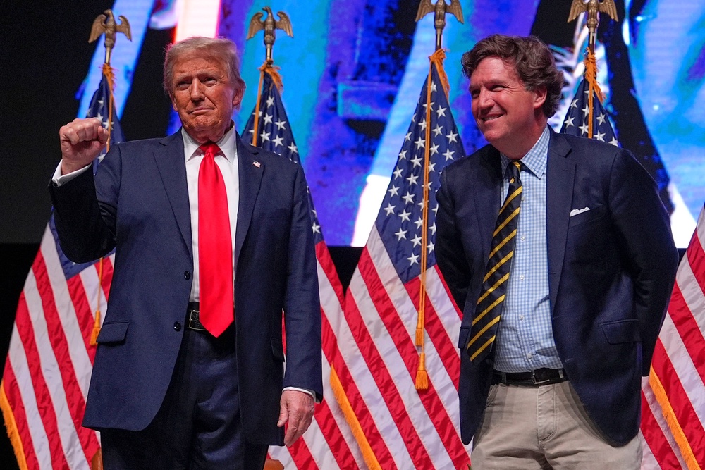 In an episode of his own self-titled show Monday, former Fox News host Tucker Carlson expressed remorse for helping get the president elected a second time and said he would be ‘tormented by it for a long time’ (AP)