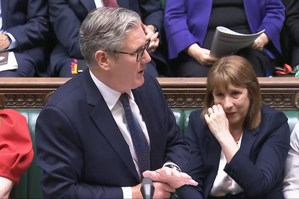 Rachel Reeves appears to wipe away tears as Sir Keir Starmer responds at the despatch box during PMQs last July (House of Commons/UK Parliament)