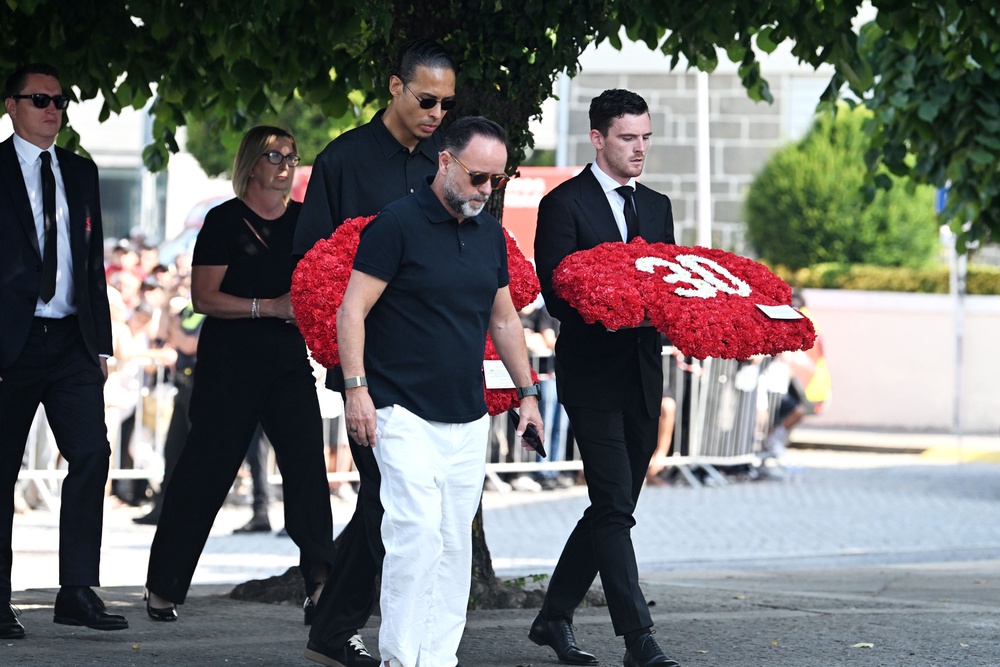 Andy Robertson (right) at the funeral of Diogo Jota and Andre Silva (PA) (PA Wire)