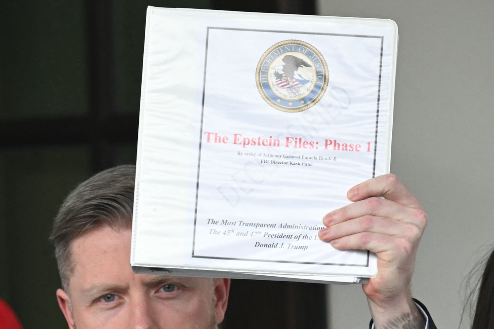 ‘As Bondi’s staff started distributing the binders, the blood pressure of other officials in the room skyrocketed. They had no idea what was in the handouts,’ the authors write (AFP/Getty)