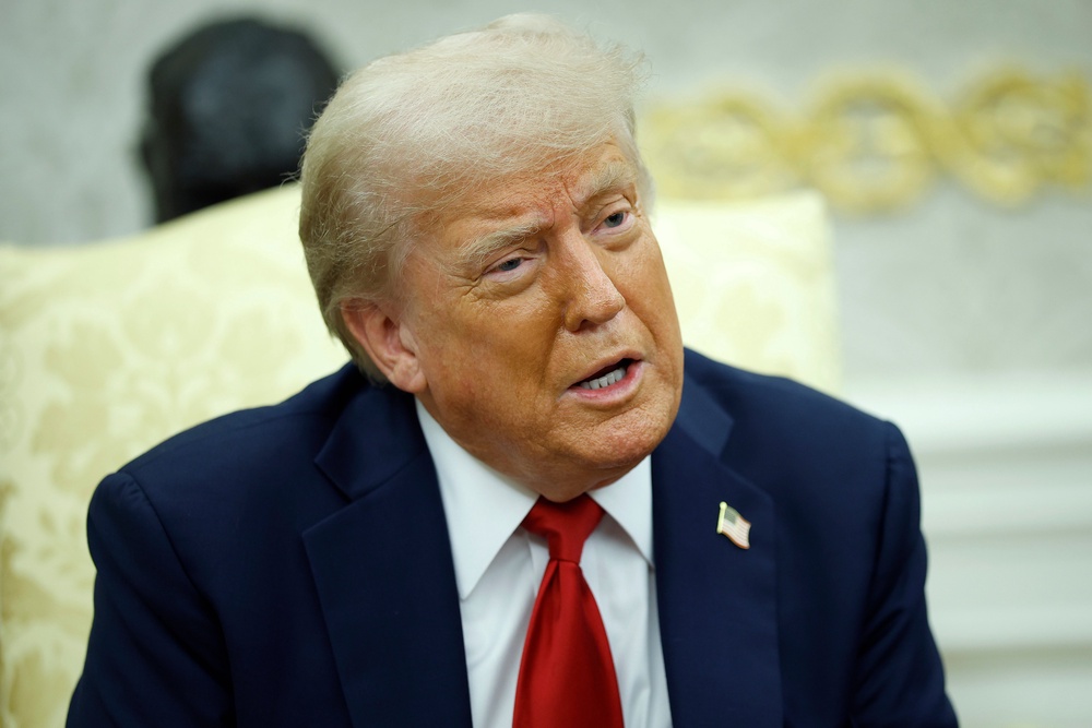 US president Donald Trump answers questions from reporters while meeting with Nato secretary general Mark Rutte in the Oval Office at the White House (Getty Images)