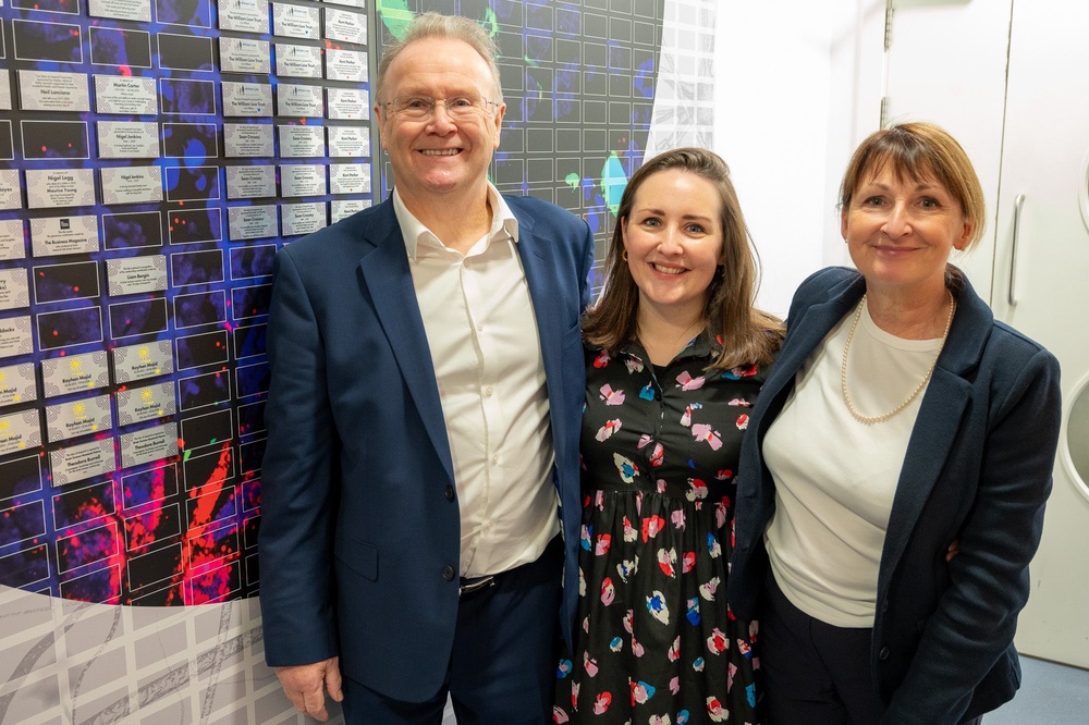 Theo Burrell with her parents, Marion and Ian (Brain Tumour Research/PA)