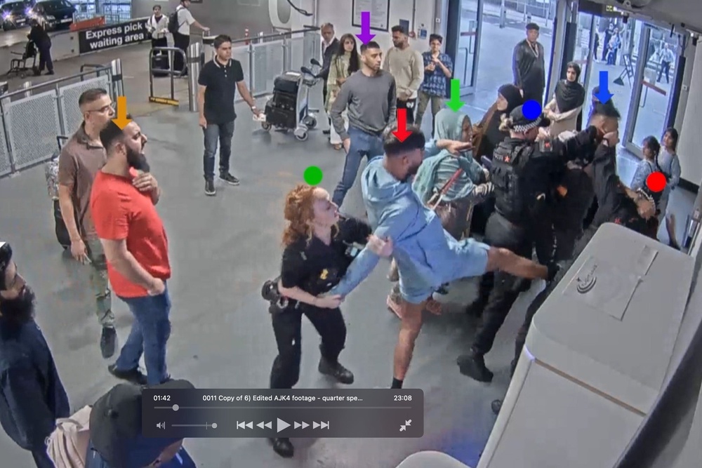CCTV still of Pc Lydia Ward (green dot) and Mohammed Fahir Amaaz (red arrow), Pc Ellie Cook (blue dot), Pc Zachary Marsden (red dot) and Muhammad Amaad (blue arrow), during the alleged assault (Aamer Anwar/PA) (PA Media)