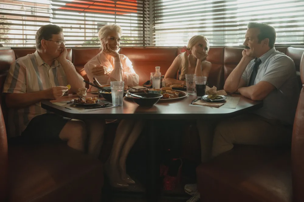 Season four of Ted Lasso will welcome the return of most of its original cast, including (pictured L-R) Jeremy Swift, Hannah Waddingham, Juno Temple, and Jason Sudeikis (Apple TV+)