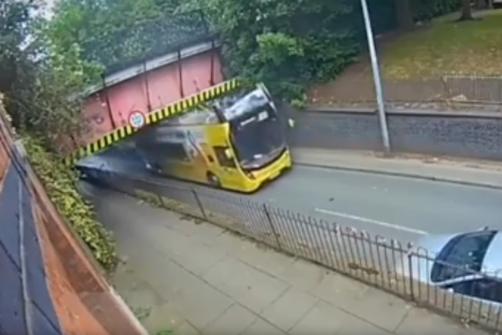 Bus driver arrested after three seriously injured in bridge crash that ...