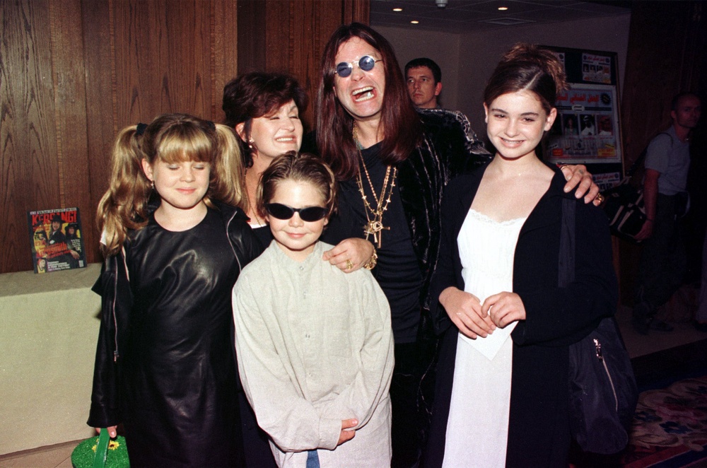 Sharon and Ozzy Osbourne with Kelly, Jack and Aimee as children (PA)