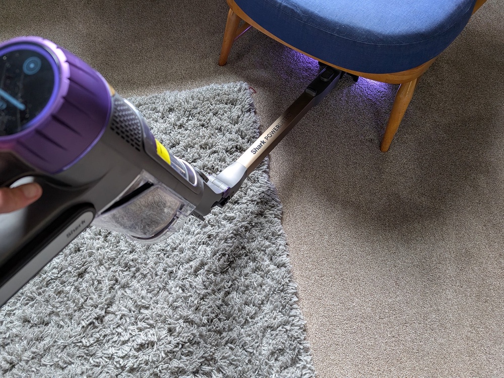 The flexible wand makes cleaning under furniture a breeze (Joanne Lewsley/The Independent)