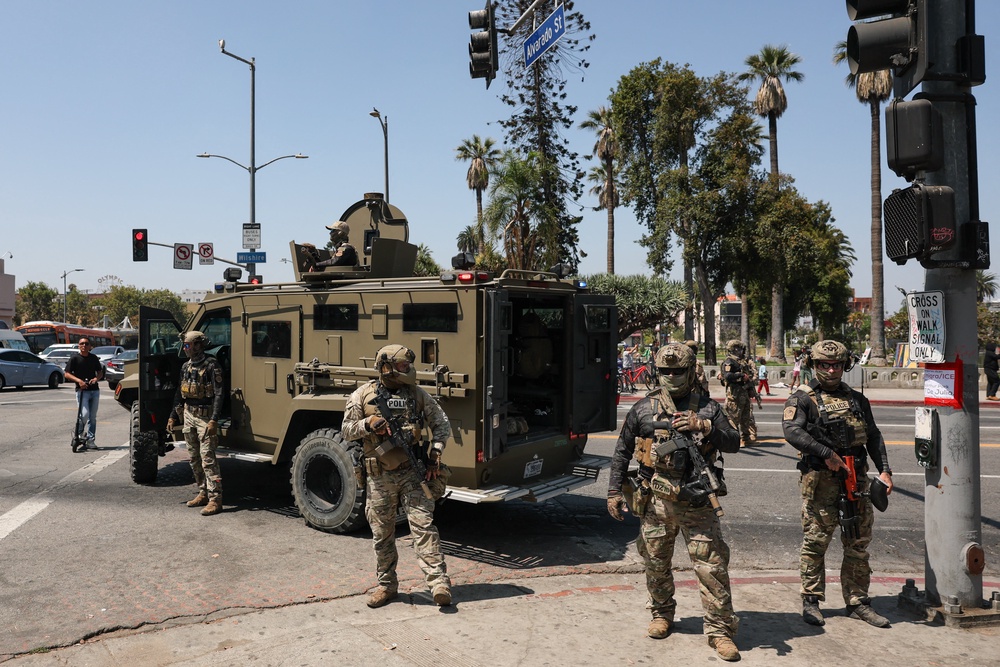 Federal immigration troops on the streets of downtown Los Angeles last summer as part of the Trump administration’s illegal immigration crackdown (AFP/Getty)