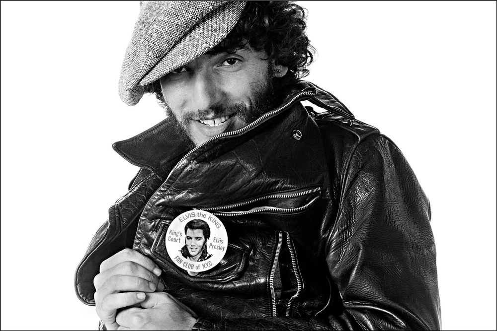 Badge of honour: Springsteen shows off the Elvis pin on his leather jacket (Courtesy of Eric Meola)