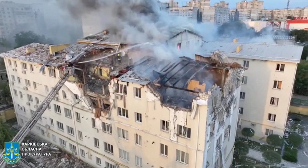 A drone view shows smoke rising from damaged buildings, at the site of an apartment building hit by a Russian drone strike in Kharkiv (Kharkiv Regional Prosecutor’s Office)