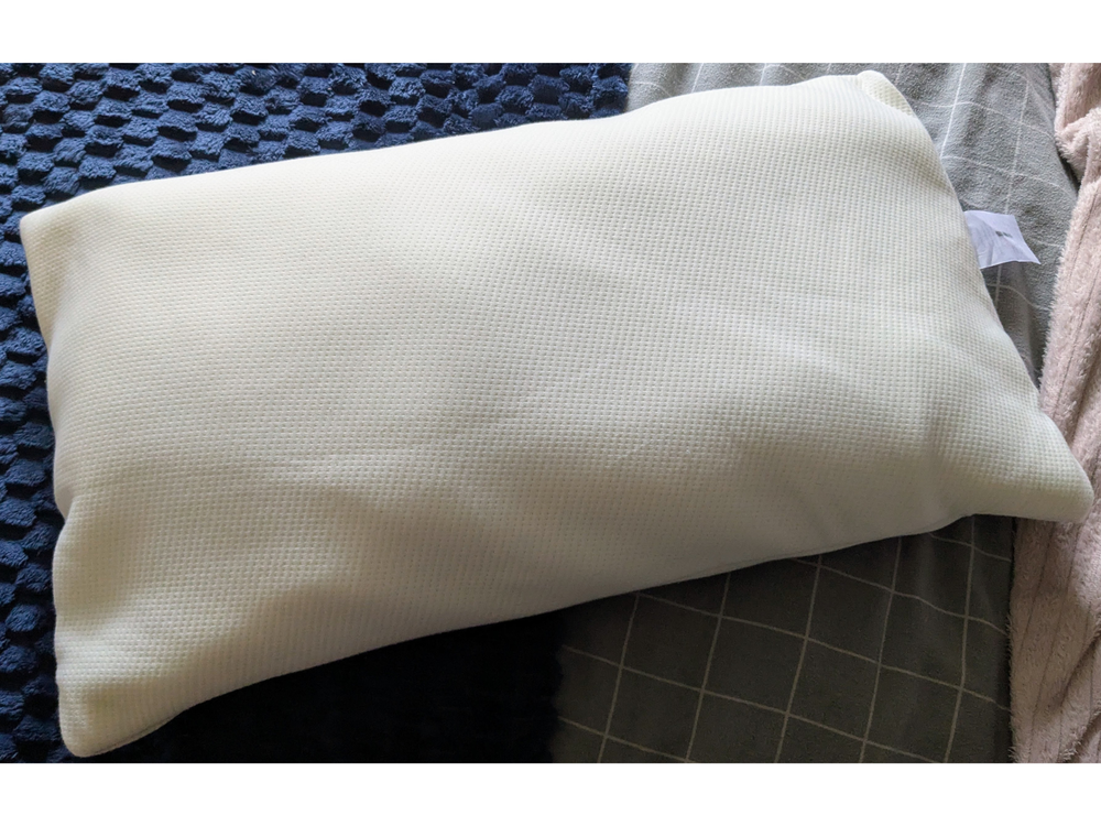 While it runs warmer than others, this pillow bounced back well after contouring my head (Caroline Preece/The Independent)