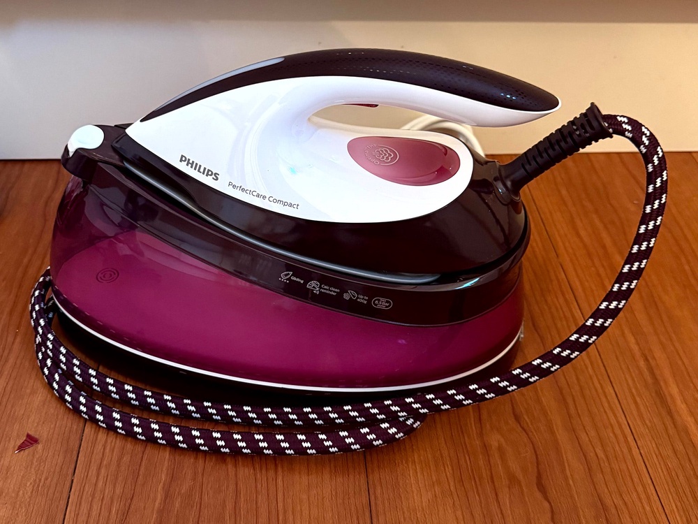 Irons are better for creating crisp creases and collars, compared with clothes steamers (Zoe Phillimore/The Independent)