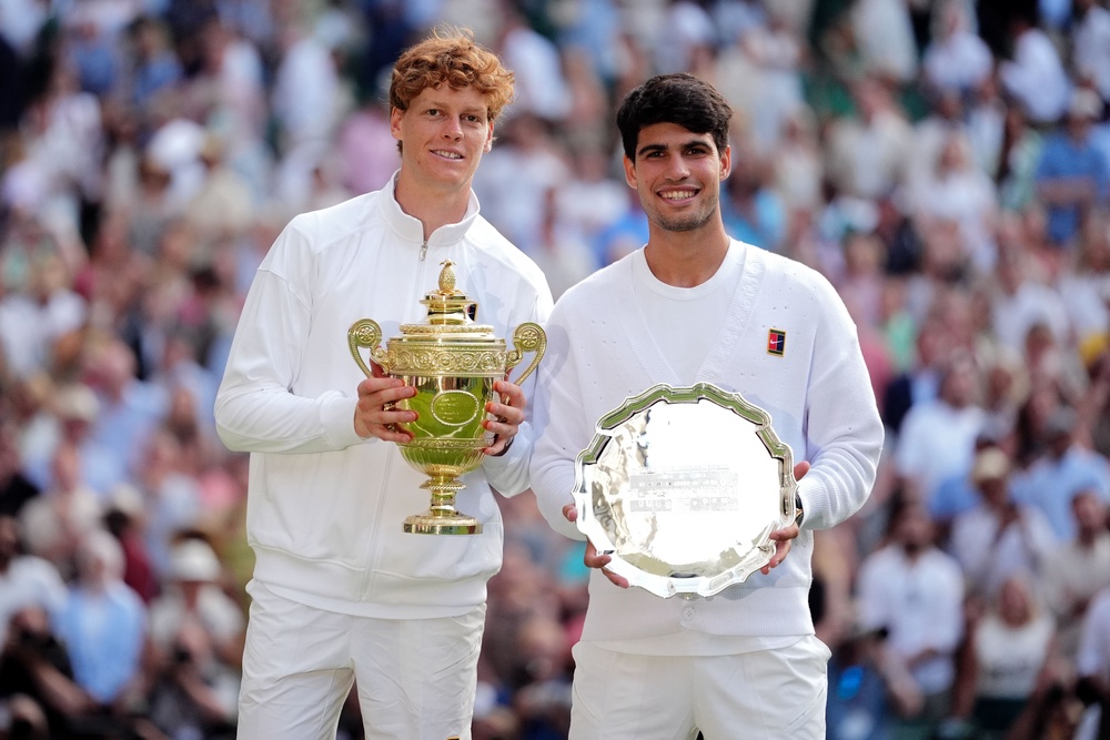 Jannik Sinner will not have Carlos Alcaraz in his path as he prepares to defend his Wimbledon title (PA Wire)